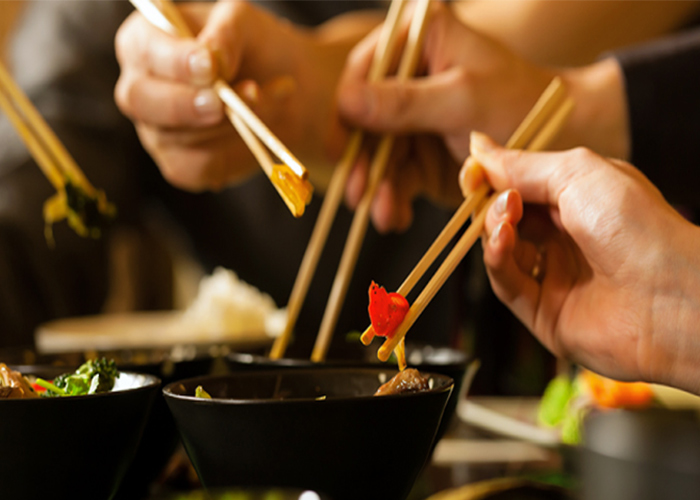 How did chopsticks spread from China to other countries in East Asia?