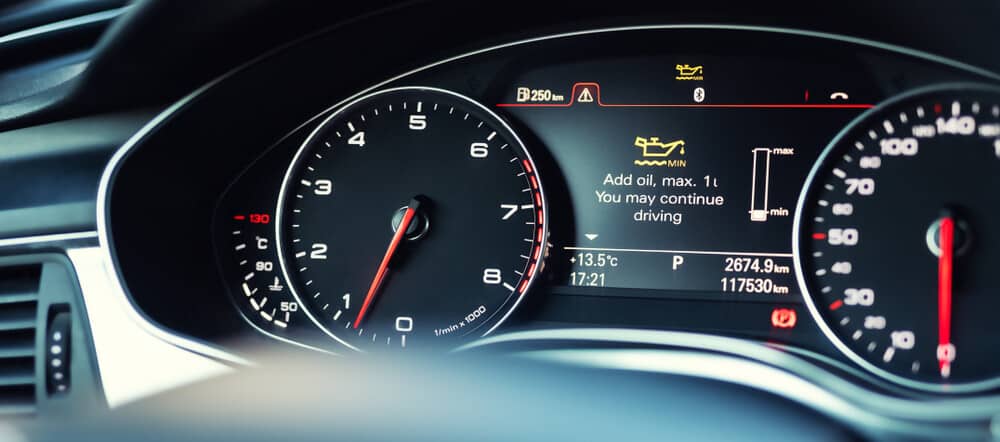 How often should I have my vehicle inspected for potential low oil pressure issues?