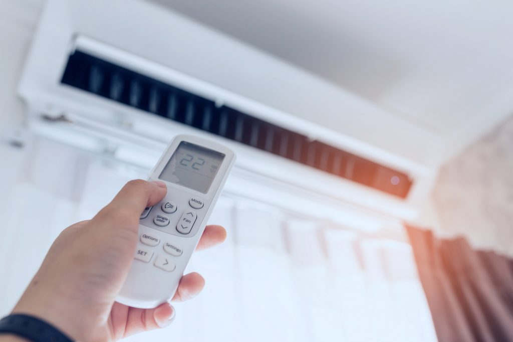 What steps can I take to prevent water leaks in my air conditioner?